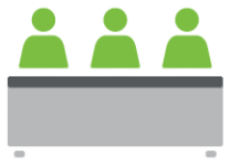Three committee members seated at a table